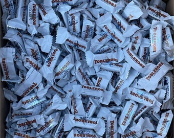 Toblerone Mini chocolat blanc 100x bouchées datées du 24/08 Pick n Mix  Choisissez -  France