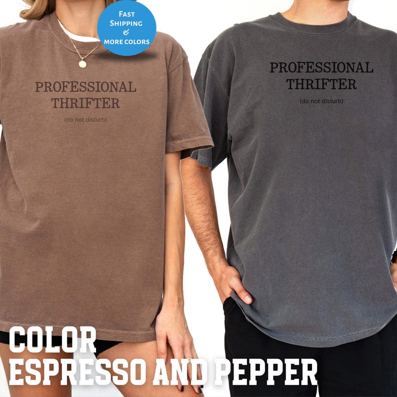May include: Two t-shirts, one espresso-colored and one pepper-colored, each with the text "PROFESSIONAL THRIFTER (do not disturb)" printed in black. The shirts are short-sleeved and appear to be made of a soft material. The image also includes a blue circle with the words "FAST SHIPPING & MORE COLORS".