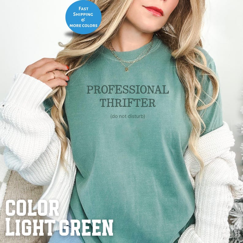 May include: Light green t-shirt with the text "PROFESSIONAL THRIFTER (do not disturb)". The shirt also has the words "COLOR LIGHT GREEN" at the bottom. A blue circle with the words "FAST SHIPPING & MORE COLORS" is in the top left corner.