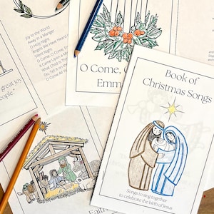 May include: A book titled "Book of Christmas Songs" with a colourful illustration of Mary and Joseph holding baby Jesus. The book has a star on the cover and the text "Songs to sing together to celebrate the birth of Jesus".