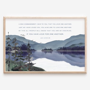 May include: A watercolour painting of a mountain lake with a quote from the Bible, John 13:34-35, "A new commandment I give to you, that you love one another: Just as I have loved you, you also are to love one another. By this all people will know that you are my disciples. If you have love for one another."