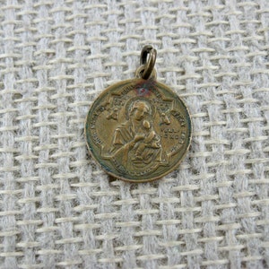 Our Lady of Perpetual Help and Saint Alphonsus De Liguori Medal, stamped Penin