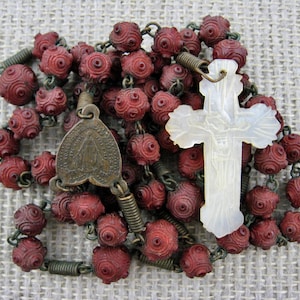 Rosary with Mother of Pearl Crucifix and Carved Wood Beads
