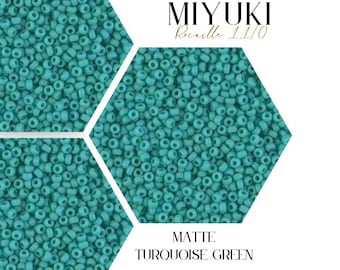 May include: A close-up of turquoise green matte Miyuki seed beads, size 11/0. The beads are arranged in a hexagonal pattern. The text "MIYUKI Rocaille 11/0" is visible in the top right corner of the image. The text "MATTE TURQUOISE GREEN" is visible in the bottom center of the image. The text "WAYFINDER BEAD SUPPLY" is visible in the bottom right corner of the image.