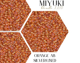 May include: Orange Miyuki seed beads with a silver lining. The beads are 11/0 size and are arranged in a hexagonal pattern.