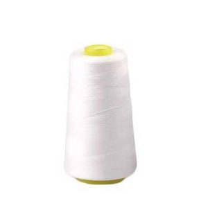 May include: A white spool of thread with a yellow plastic top.