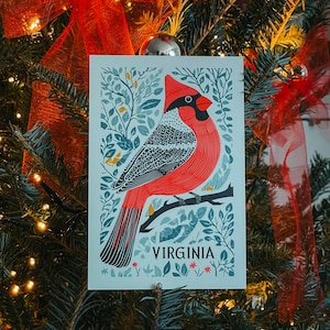 Virginia postcard featuring a state symbol — red cardinal bird. A perfect 4x6" Virginia souvenir for nature lovers, posrcrossers, snail mail lovers, bird watchers, and wildlife enthusiasts. Printed on premium matte cardstock, capturing the serene beauty of Virginia’s waterways. Wonderful watercolor postcard for mailing.