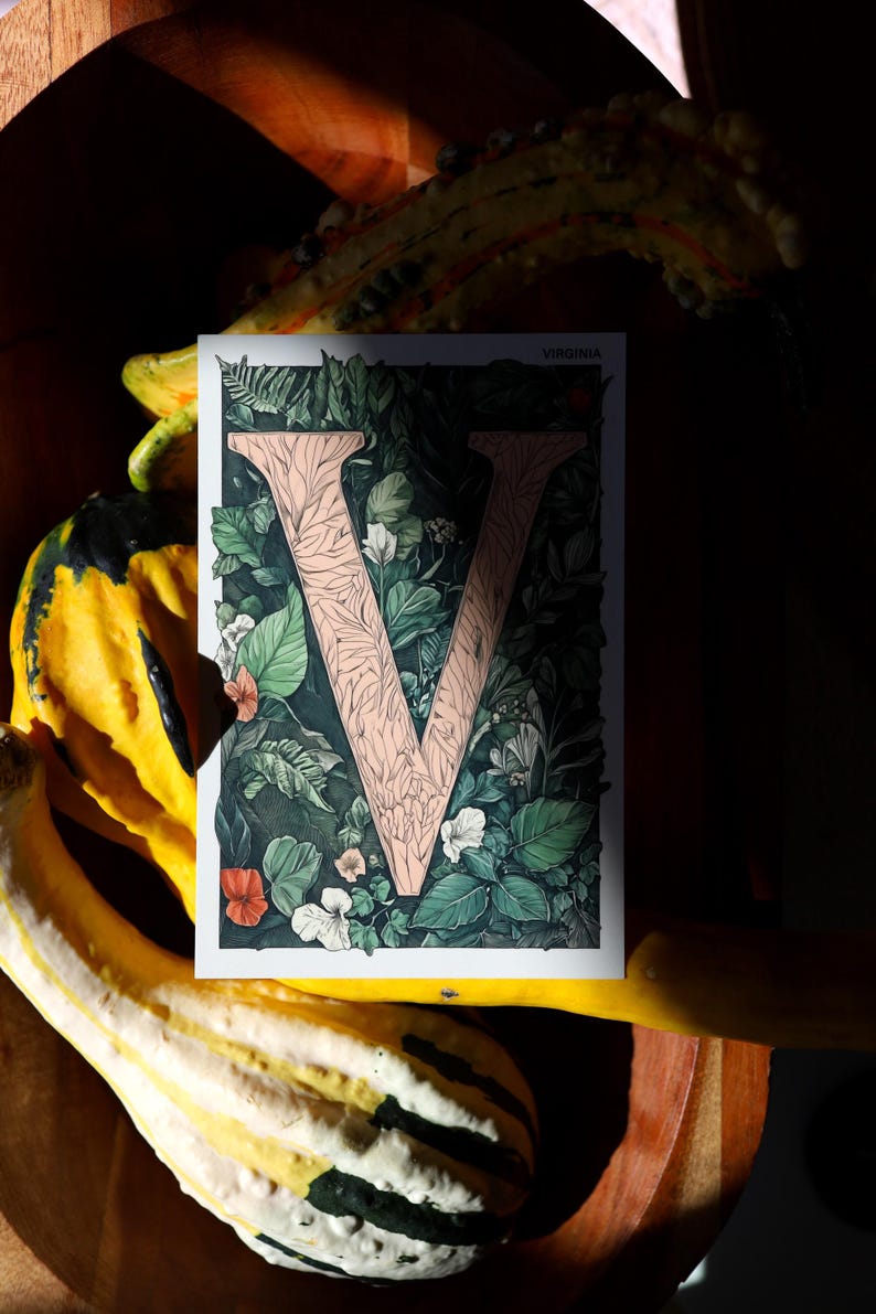 Virginia 4x6 postcard featuring the letter "V" decorated with lush green leaves and botanical details, celebrating the state's rich natural beauty. A perfect 4x6" Virginia souvenir, printed on high-quality matte cardstock for nature lovers, postcrossers, and plant enthusiasts.