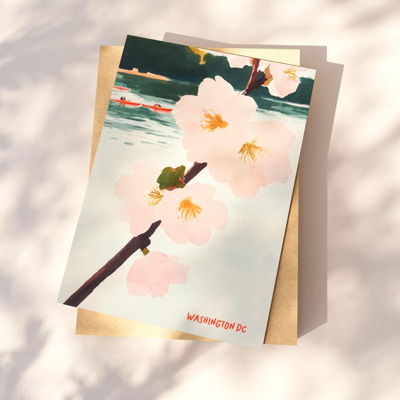 Watercolor illustration of cherry blossoms in Washington, DC’s Georgetown neighborhood, featuring the Potomac River, boats, and kayaks in the background. A charming springtime scene perfect for DC souvenirs and cherry blossom lovers.