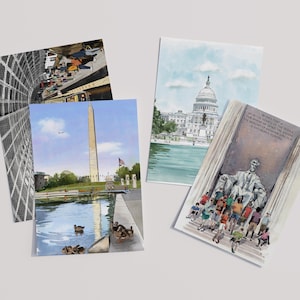 May include: A collection of four postcards featuring watercolor illustrations of Washington D.C. landmarks. The images include the Washington Monument, the U.S. Capitol, and the Lincoln Memorial. One postcard shows a view of a building's interior.