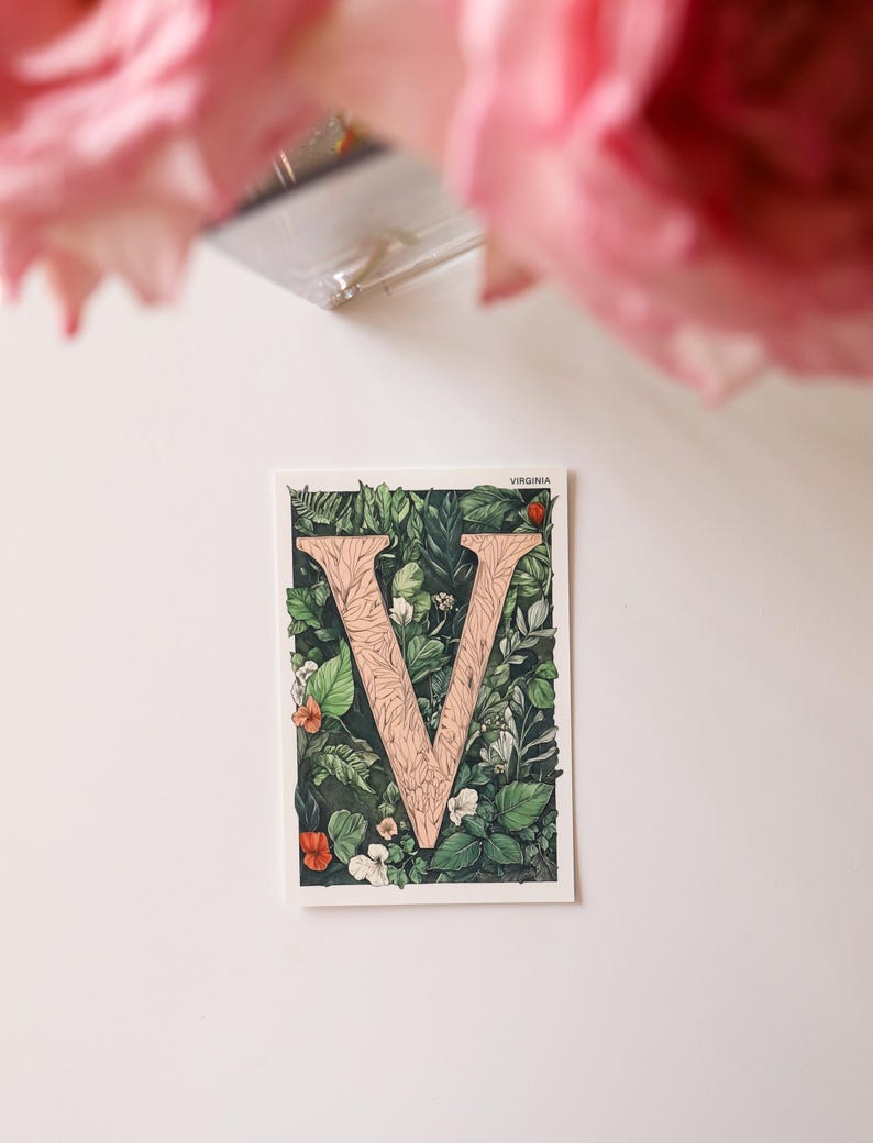Virginia 4x6 postcard featuring the letter "V" decorated with lush green leaves and botanical details, celebrating the state's rich natural beauty. A perfect 4x6" Virginia souvenir, printed on high-quality matte cardstock for nature lovers, postcrossers, and plant enthusiasts.