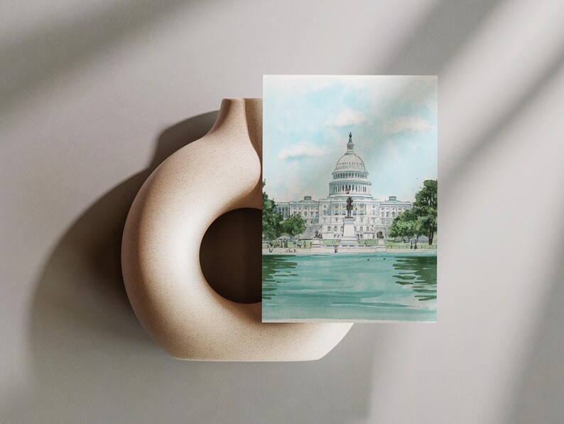 Hand-drawn Washington DC postcard featuring watercolor illustration with the US Capitol Building. Elegant 4x6 postcard with watercolor-style artwork, perfect for Washington DC tourists, DC locals, collectors, post crossers, and travel souvenirs collectors.