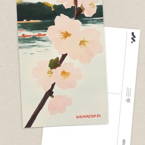 Watercolor illustration of cherry blossoms in Washington, DC’s Georgetown neighborhood, featuring the Potomac River, boats, and kayaks in the background. A charming springtime scene perfect for DC souvenirs and cherry blossom lovers.