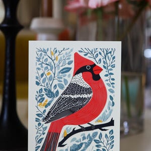 Virginia postcard featuring a state symbol — red cardinal bird. A perfect 4x6" Virginia souvenir for nature lovers, posrcrossers, snail mail lovers, bird watchers, and wildlife enthusiasts. Printed on premium matte cardstock, capturing the serene beauty of Virginia’s waterways. Wonderful watercolor postcard for mailing.