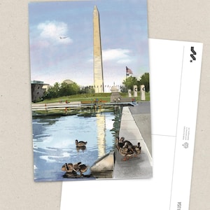 Hand-painted watercolor and pen illustration postcard of The Washington Monument in Washington, DC, featuring a charming duck family swimming in the Reflecting Pool. A whimsical and artistic postcard, perfect as a DC travel souvenir or gift for nature lovers.