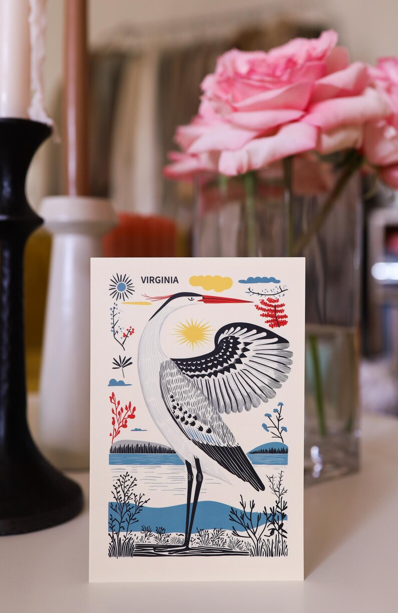 Virginia postcard featuring a majestic heron, the state’s graceful water bird, standing by the water’s edge. A perfect 4x6" Virginia souvenir for nature lovers, posrcrossers, snail mail lovers, bird watchers, and wildlife enthusiasts. Printed on premium matte cardstock, capturing the serene beauty of Virginia’s waterways. Wonderful watercolor postcard for mailing.