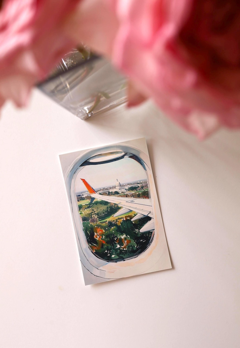 Hand-drawn Washington DC postcard featuring watercolor and ink illustration with the US Capitol Building seen from the airplane window. Elegant 4x6 postcard with watercolor-style artwork, perfect for Washington DC tourists, DC locals, collectors, post crossers, and travel souvenirs collectors.