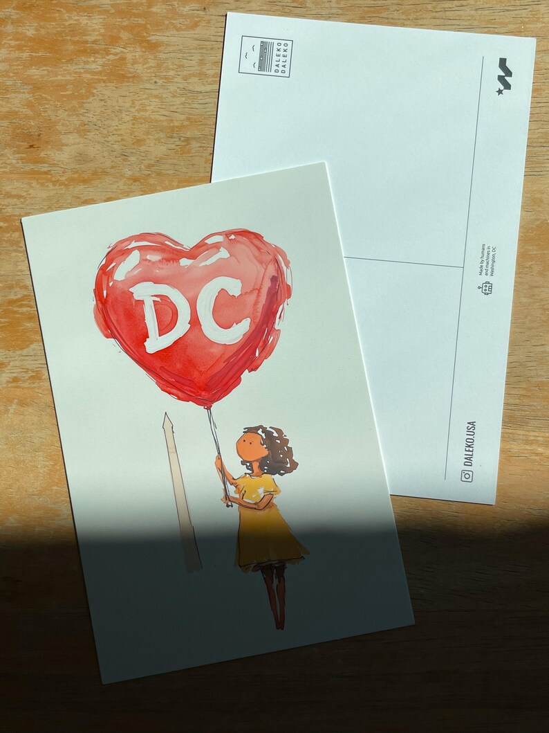 Watercolor illustration of a girl holding a red heart-shaped balloon with "DC" written on it, standing near The Washington Monument. The charming postcard captures the spirit of Washington, DC, with a dreamy, whimsical touch. Perfect for DC lovers, travel enthusiasts, and postcard collectors, this 4x6 design makes a unique souvenir or gift. Printed on premium cardstock with a matte finish, it’s ideal for mailing, framing, or adding to your collection.