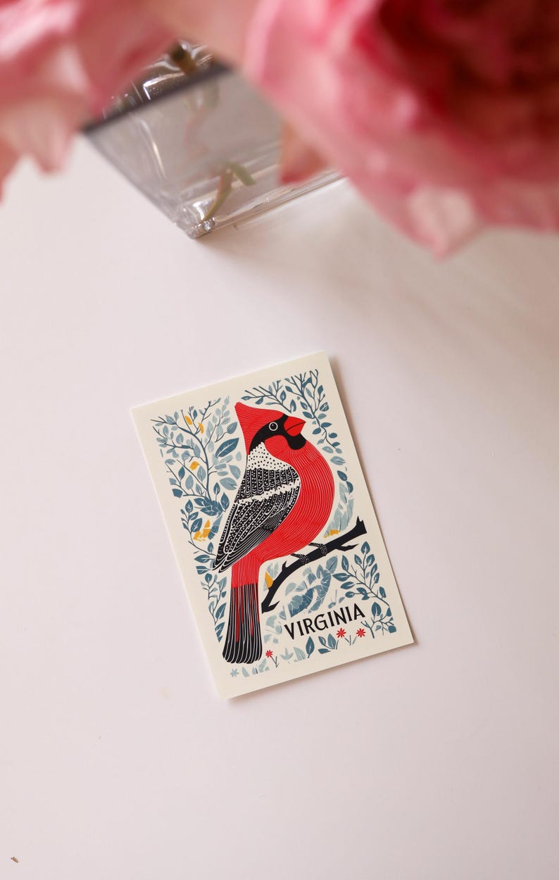 Virginia postcard featuring a state symbol — red cardinal bird. A perfect 4x6" Virginia souvenir for nature lovers, posrcrossers, snail mail lovers, bird watchers, and wildlife enthusiasts. Printed on premium matte cardstock, capturing the serene beauty of Virginia’s waterways. Wonderful watercolor postcard for mailing.