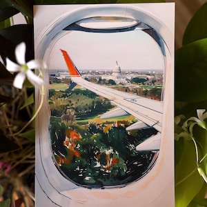 Hand-drawn Washington DC postcard featuring watercolor and ink illustration with the US Capitol Building seen from the airplane window. Elegant 4x6 postcard with watercolor-style artwork, perfect for Washington DC tourists, DC locals, collectors, post crossers, and travel souvenirs collectors.