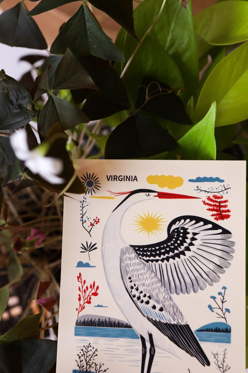 Virginia postcard featuring a majestic heron, the state’s graceful water bird, standing by the water’s edge. A perfect 4x6" Virginia souvenir for nature lovers, posrcrossers, snail mail lovers, bird watchers, and wildlife enthusiasts. Printed on premium matte cardstock, capturing the serene beauty of Virginia’s waterways. Wonderful watercolor postcard for mailing.