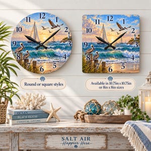 May include: Two wall clocks featuring a coastal scene with a sailboat, pelicans, and a lighthouse. One clock is round and the other is square. Text on the image indicates available styles and sizes of 10.75 inches by 10.75 inches or 8 inches by 8 inches.