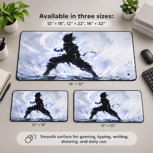 May include: Three rectangular desk mats featuring a black silhouette of a spiky-haired figure surrounded by blue energy effects. Text states: Available in three sizes: 12" x 18", 12" x 22", 16" x 32". Smooth surface for gaming, typing, writing, drawing, and daily use.