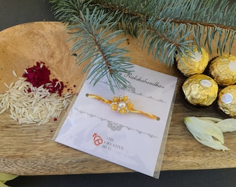 Yellow flower rakhi | raksha bandhan | handmade | customized | personalized | crystals | indian bracelet | rakhi for brother | beaded rakhri
