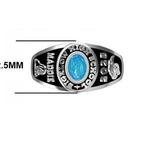 May include: A silver class ring with a black background and a blue stone. The ring says "Maddie High School 2023" and has a small image of a dolphin on the side.