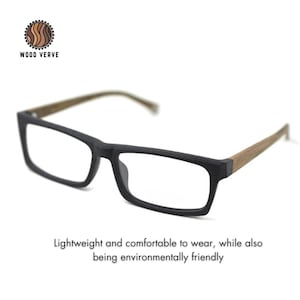 May include: Black rectangular eyeglasses with brown wooden arms. The glasses are lightweight and comfortable to wear, while also being environmentally friendly. "WOOD VERVE" is printed on the logo.