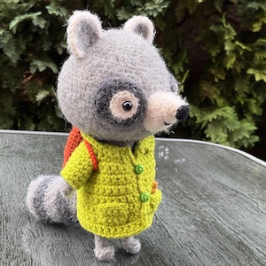 Raccoon Remy - crocheted, amigurumi, handmade, decorative figure, with coat, with backpack