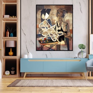 以下が含まれることがあります： 白い幾何学的な形を持った人物を描いた抽象画。手前にテーブルとカラフルなオブジェクトがある。絵は額装され、壁にかけられている。