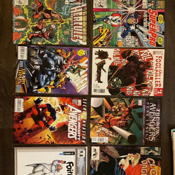 Five random “Marvel and Dc” comic books