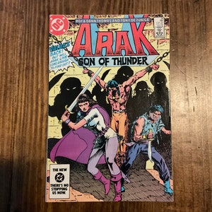 May include: A comic book cover featuring a colorful illustration of a group of characters. The cover is titled "Arak, Son of Thunder". The text "Valdas Back! But will Arak live long enough to find out?" is featured on the cover. The text "The New There's No Stopping Us Now." is also featured on the cover.
