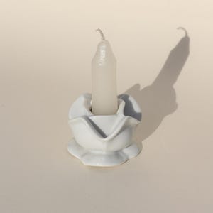 Ceramic flower shaped candle holder
