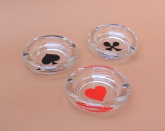 Glass ashtrays playing cards