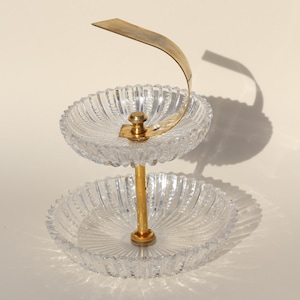 2-tier glass and brass buffet display