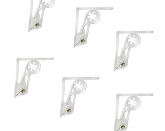 May include: Six clear plastic curtain clips with a metal clip on the bottom. The clips are designed to hold curtains in place.