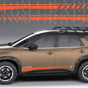 May include: A bronze SUV with a black roof, black roof rack, and black wheel arches. The vehicle features orange side decals with the text PATHFINDER. Above the vehicle, a graphic shows the same orange decal design with the text PATHFINDER.