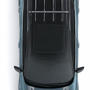 May include: A top-down view of a blue SUV featuring a black roof, a silver roof rack with multiple crossbars, and two light-coloured racing stripes on the bonnet. The vehicle has side mirrors and a sunroof visible from this overhead perspective.