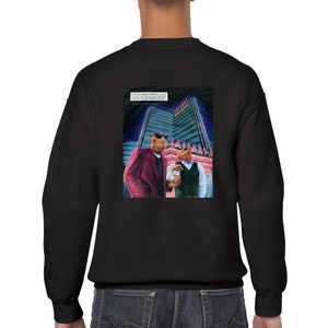 Könnte beinhalten: Schwarzer Pullover mit einer Vintage-Werbung auf der Rückseite, die zwei Comic-Kamele vor dem Caesars Palace Hotel in Las Vegas zeigt. Der Werbetext lautet "Warnung: Der Surgeon General hat festgestellt, dass Rauchen gesundheitsschädlich ist."
