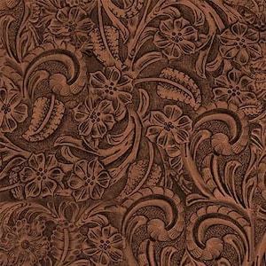 May include: A brown leather background with an embossed floral pattern. The pattern features intricate swirls and flowers.
