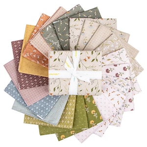 May include: A selection of fabric squares featuring floral and geometric designs in shades of green, beige, pink, and brown. A bundle of fabric is tied with a white ribbon. The word "colorfully" is printed on the ribbon.