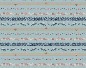 May include: A seamless pattern featuring a repeating design of blue and white floral motifs, pink flowers, and brown ribbon-like elements on a light blue background.