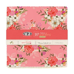 May include: A pack of 10-inch fabric squares featuring a floral pattern with pink, white, and green flowers on a pink background. The pack is labelled "10" fabric wonders" and "open heart" by Maureen Cracknell.
