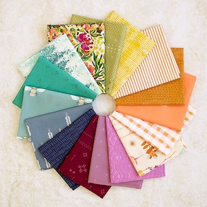 May include: A collection of 16 fabric squares in various patterns and colors, including floral, geometric, and abstract designs. The squares are arranged in a circle, with the colors transitioning from green to orange.