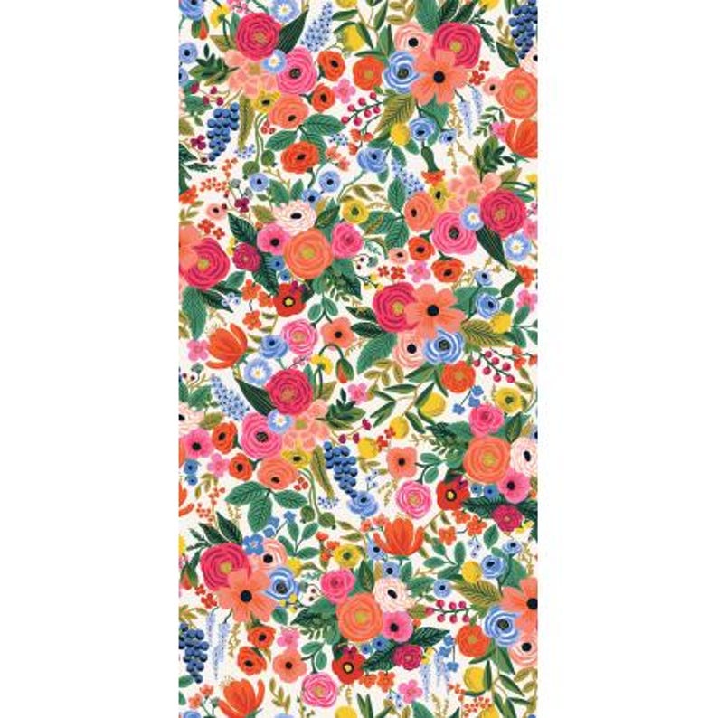 May include: A white background with a floral pattern featuring pink, red, orange, yellow, blue, and green flowers. The flowers are arranged in a random pattern and are of various sizes.