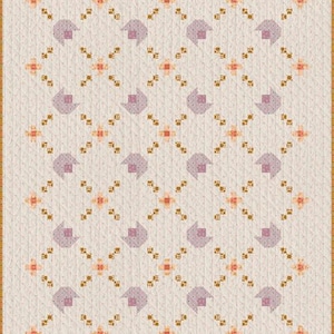 May include: A quilted blanket with a repeating pattern of stylized purple houses and orange floral accents on a cream background. The quilt has a patterned border and is likely handmade.