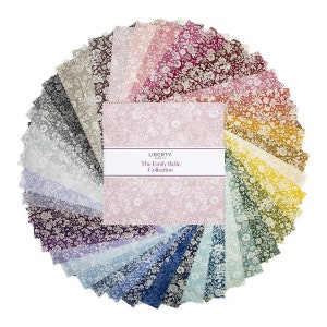 May include: A collection of fabric squares from The Emily Belle Collection, arranged in a semi-circle. The fabrics feature floral patterns in a variety of colors, including pinks, blues, greens, and yellows. The collection is from Liberty Fabrics.