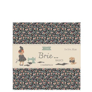 May include: A stack of fabric squares with a floral pattern in black, pink, and white. The label reads "Tilda Brie Basics Charmpack" and features illustrations of a girl, sewing machine, and dog. Each square measures 5 x 5 inches.